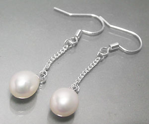 Lujosos aretes de plata con piedras preciosas de perlas genuinas