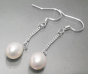 Lujosos aretes de plata con piedras preciosas de perlas genuinas