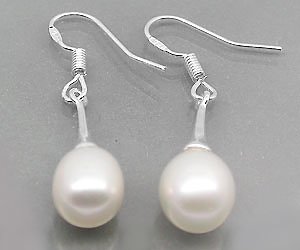 Lujosos aretes de plata con piedras preciosas de perlas genuinas