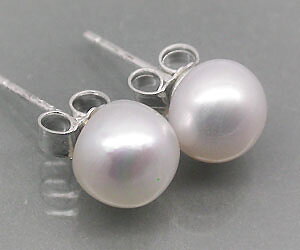 Lujosos aretes de plata con piedras preciosas de perlas genuinas