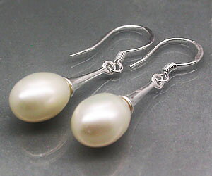 Lujosos aretes de plata con piedras preciosas de perlas genuinas