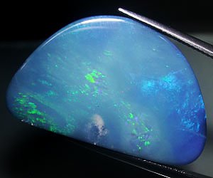 Piedra preciosa de ópalo arco iris natural de lujo enorme de 23,20 ct