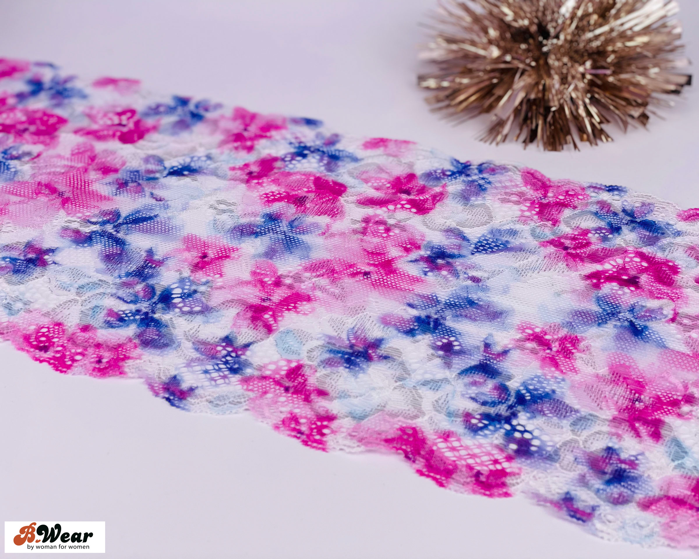 White stretch lace with flowers in pastel colors