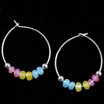 Round Pan earrings in precious stones