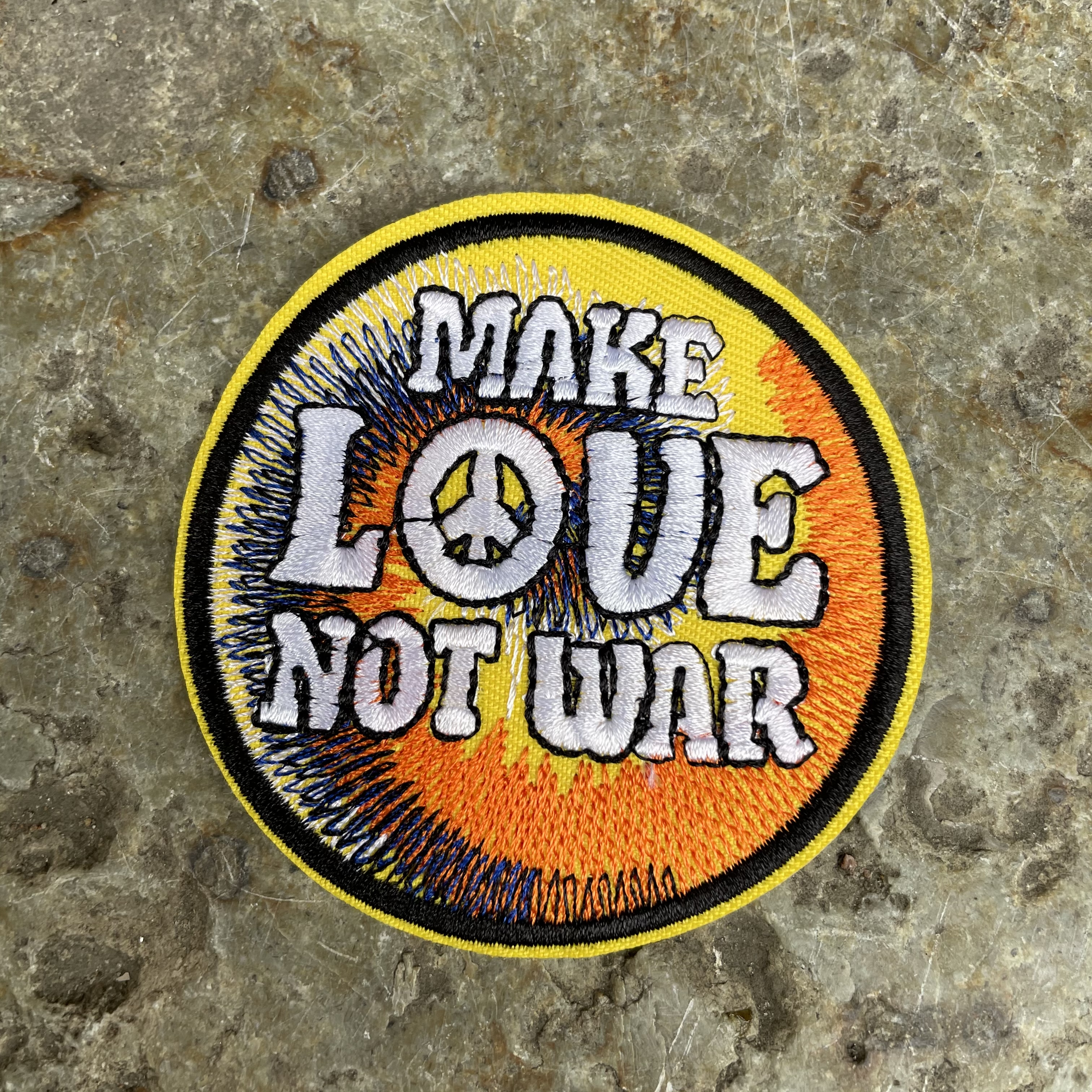 Tygmärke make love Not war 