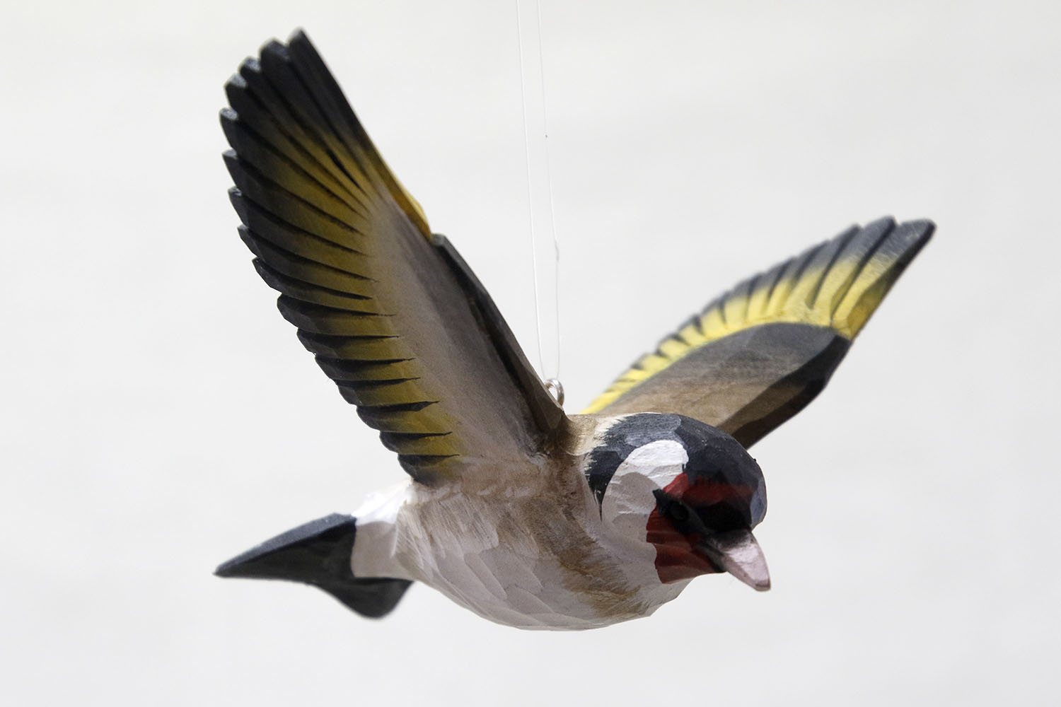 goldfinch in flight