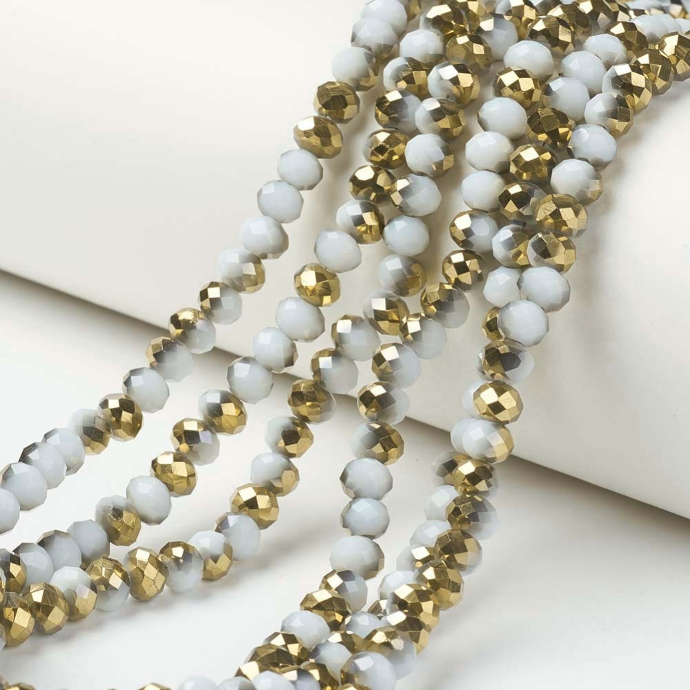 Faceted,   6mm,  graywhite/gold, 1 strand