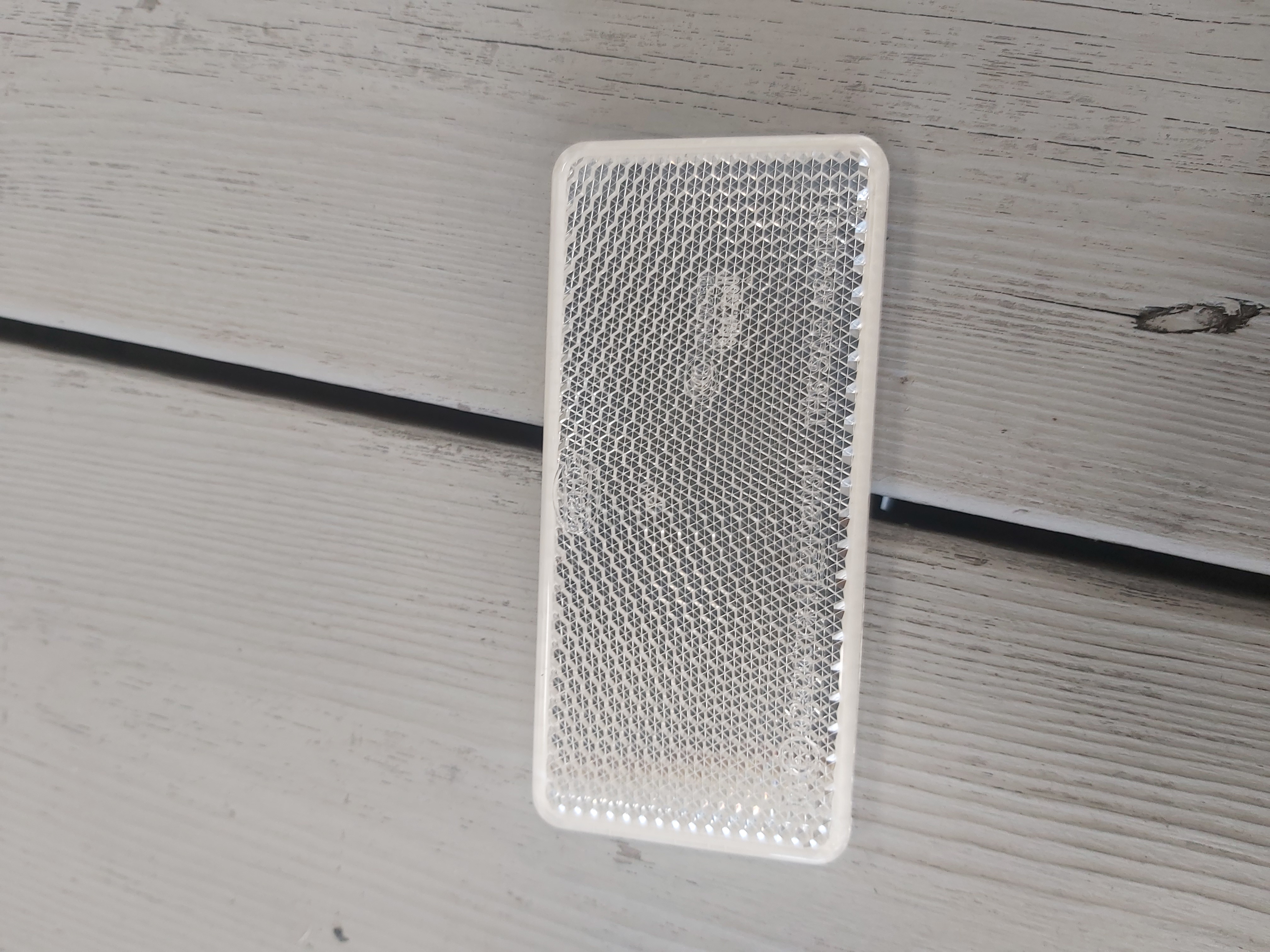 Reflex vit 70x32mm självhäft