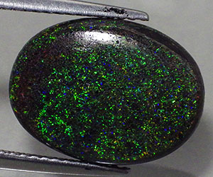 Piedra preciosa de ópalo macizo natural única de forma ovalada muy grande de 6,13 ct