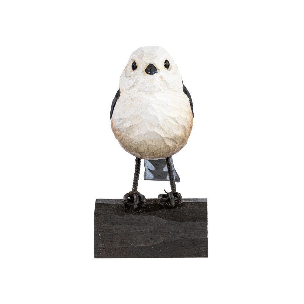 DecoBird Starling seen from the front, standing on a small wooden base against a light background.