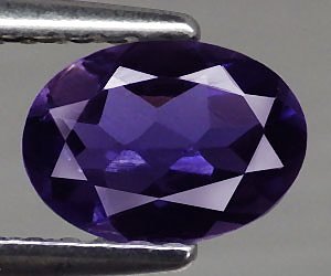 Deliciosamente hermosa piedra preciosa de iolita natural ovalada de 7x5 mm adecuada para la curación