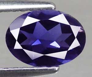 Piedra preciosa de iolita natural ovalada de 0,57 ct deliciosamente hermosa de 7x5 mm apta para la curación