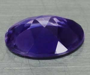 Piedra preciosa de iolita natural ovalada de 0,57 ct deliciosamente hermosa de 7x5 mm apta para la curación - 2