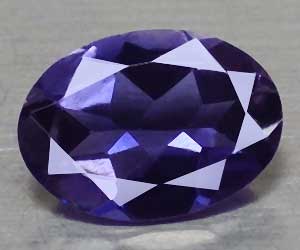 Piedra preciosa de iolita natural ovalada de 0,57 ct deliciosamente hermosa de 7x5 mm apta para la curación - 3