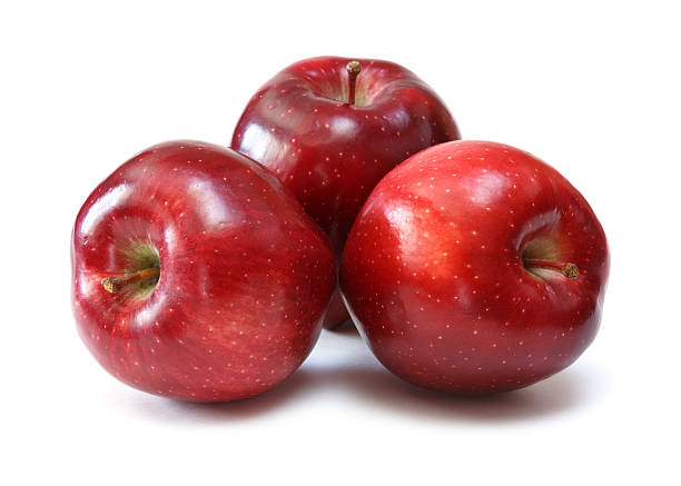 Three red apples