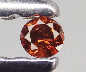 Diamante rojo naranja redondo genuino muy raro de 1,7 mm natural