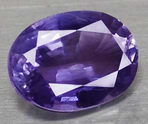 Piedra preciosa de iolita natural ovalada de 0,74 ct deliciosamente hermosa de 7x5 mm apta para la curación - 3