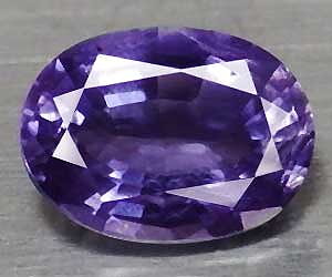 Piedra preciosa de iolita natural ovalada de 0,74 ct deliciosamente hermosa de 7x5 mm apta para la curación