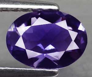 Piedra preciosa de iolita natural ovalada de 0,52 ct muy hermosa de 7x5 mm apta para la curación - 3