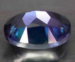 Piedra preciosa de topacio azotico arcoíris natural ovalada hermosa de 1,51 quilates de 8x6 mm - 2
