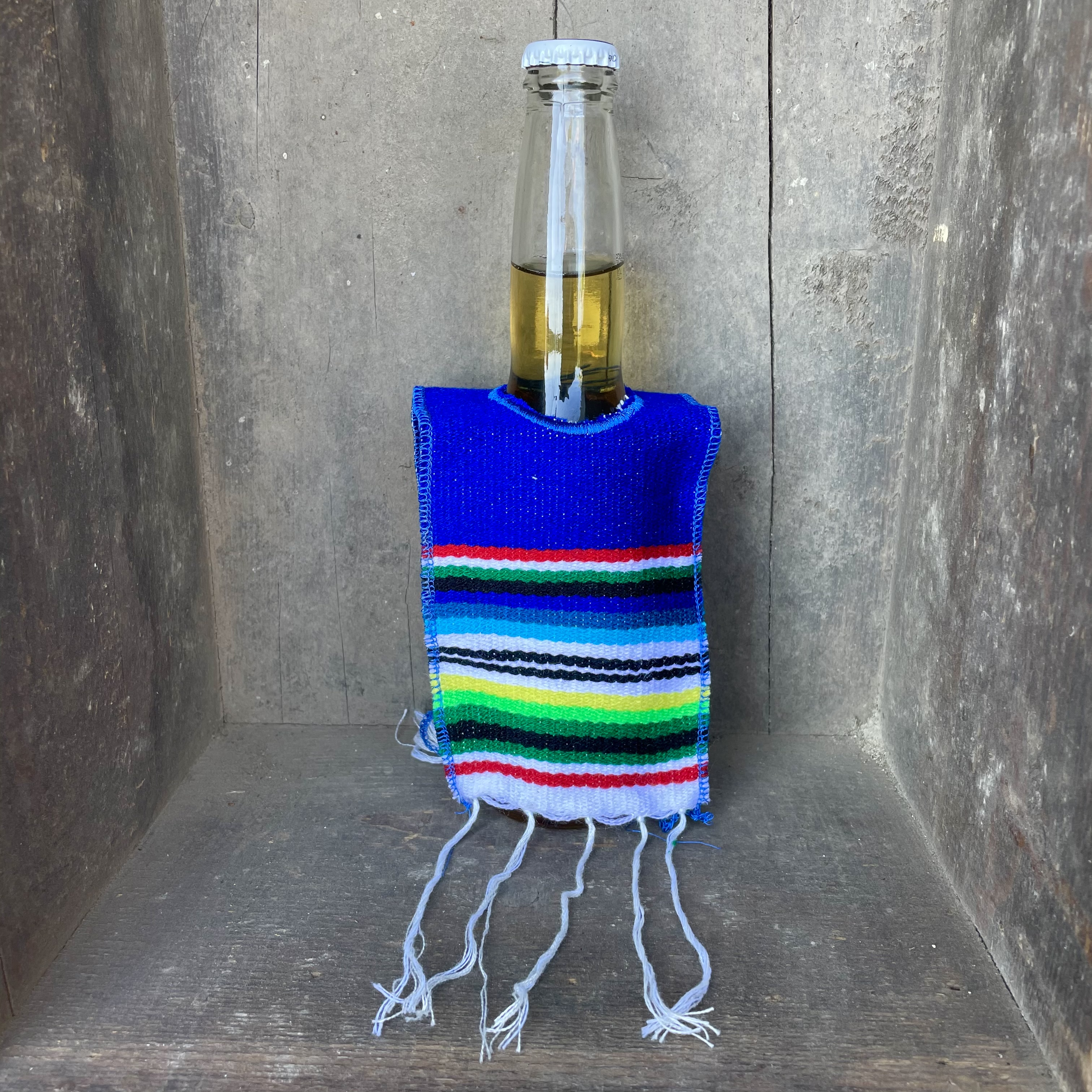 Ölponcho blå