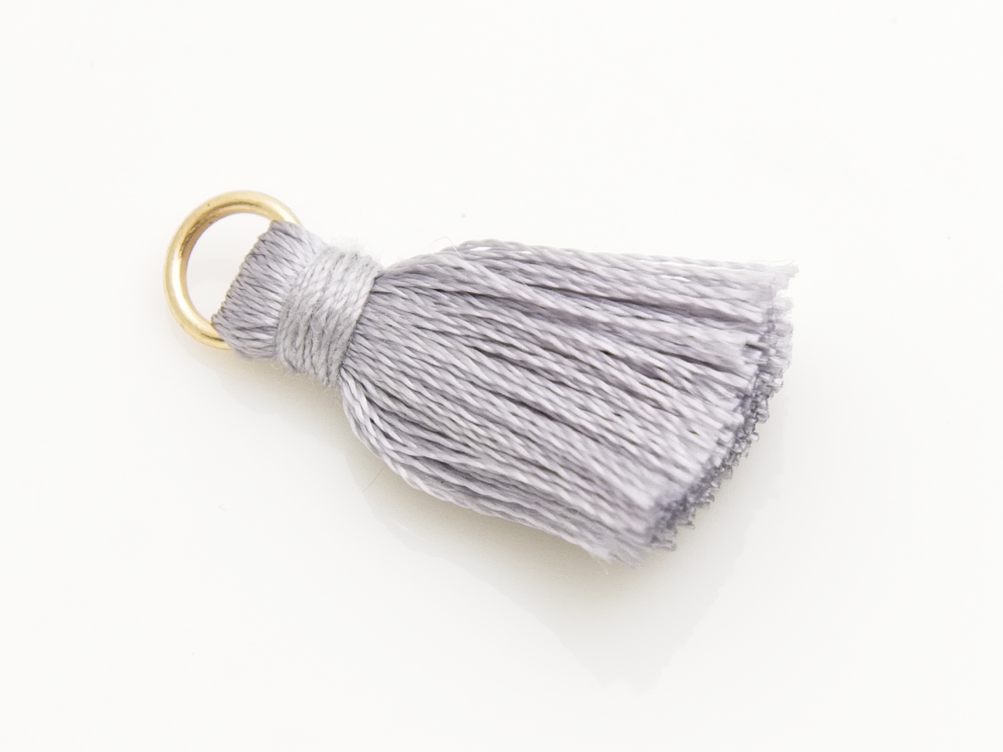 Mini tassel - grå