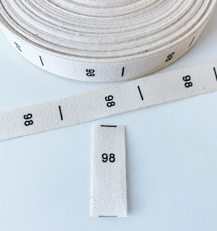 Printed cotton label to fold, size 98