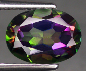 Piedra preciosa de topacio azotico arcoíris natural ovalada hermosa de 1,73 quilates de 8x6 mm