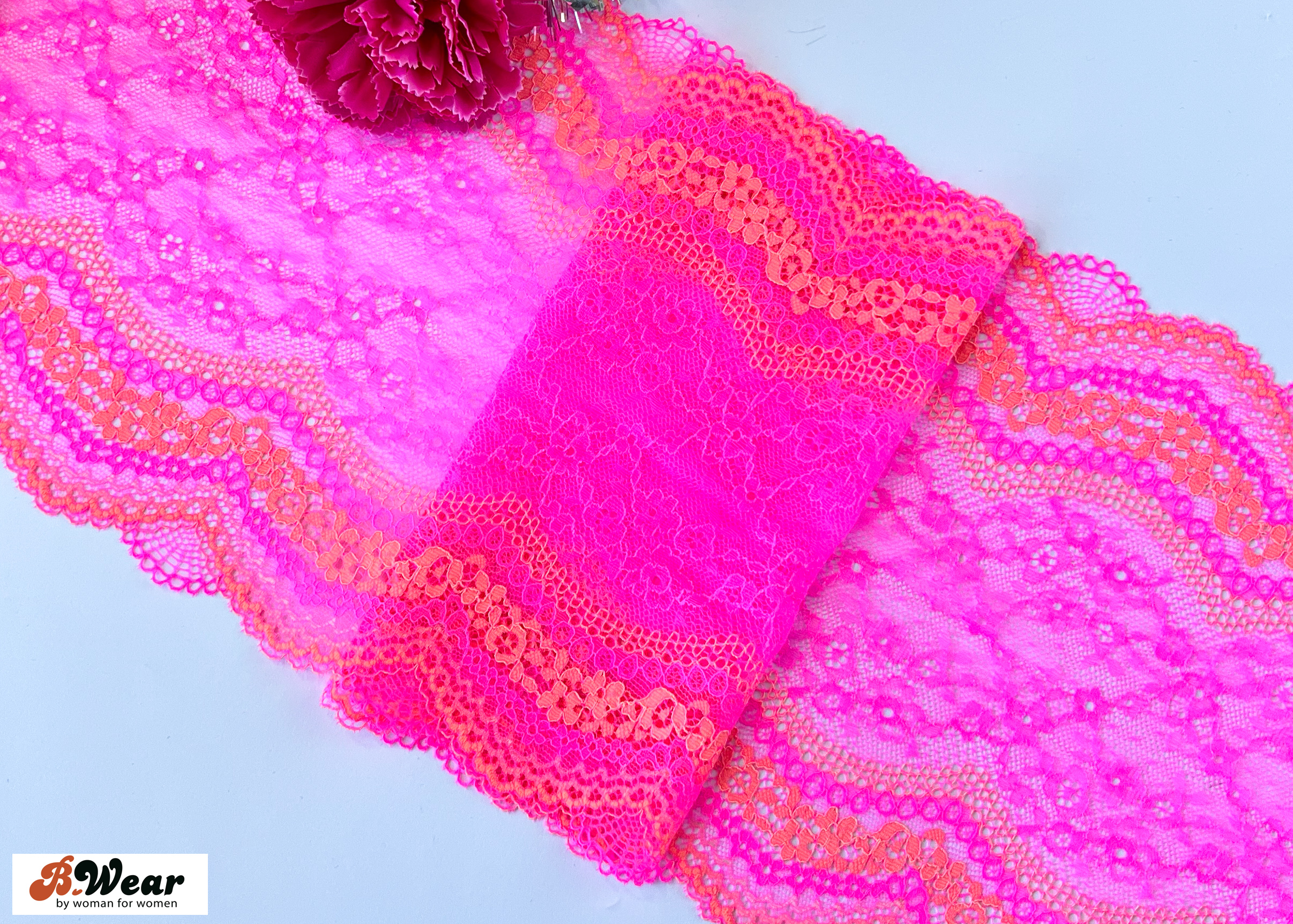 Pinkcerise stretch lace with orange decor