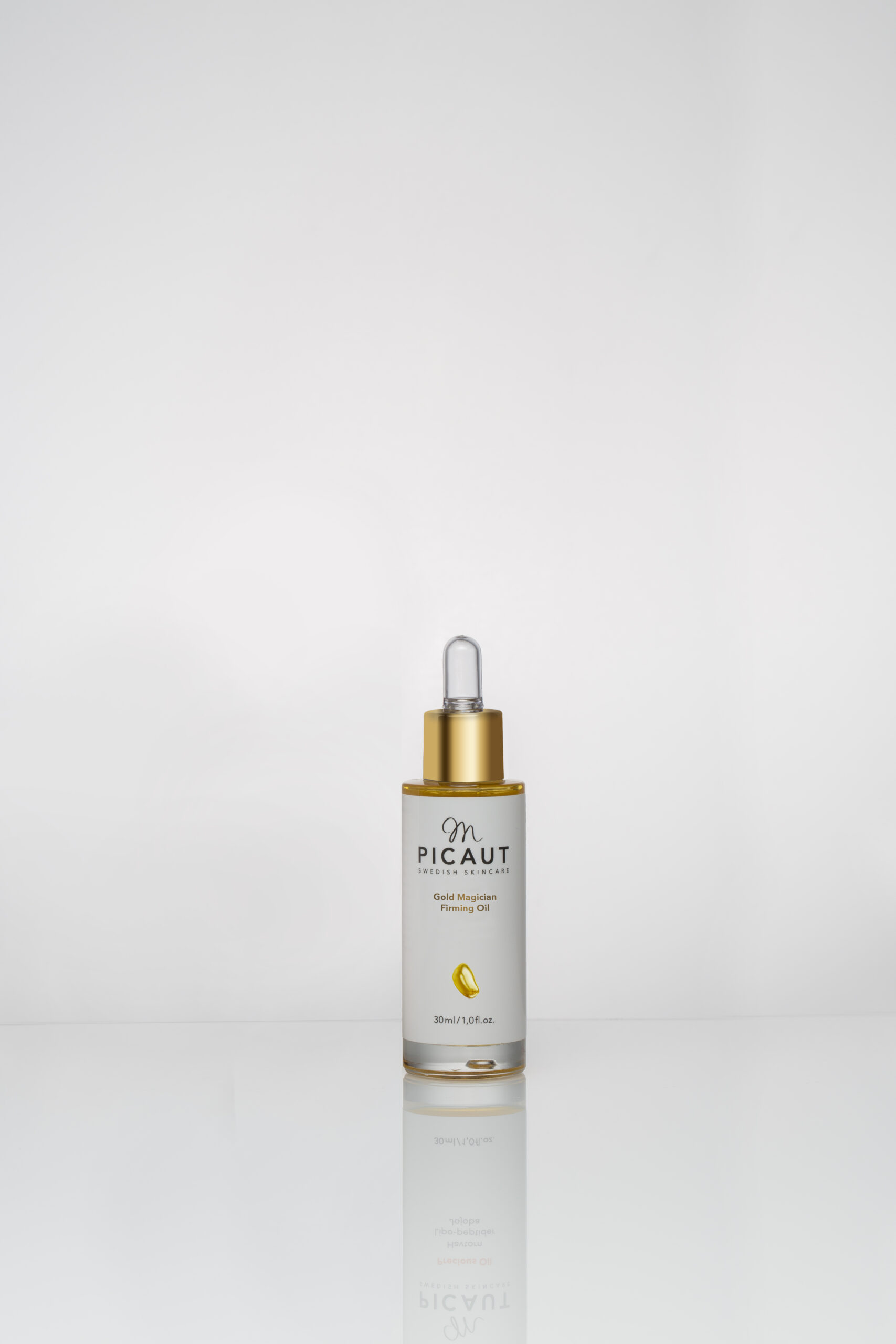 Gold Magician Firming Oil 