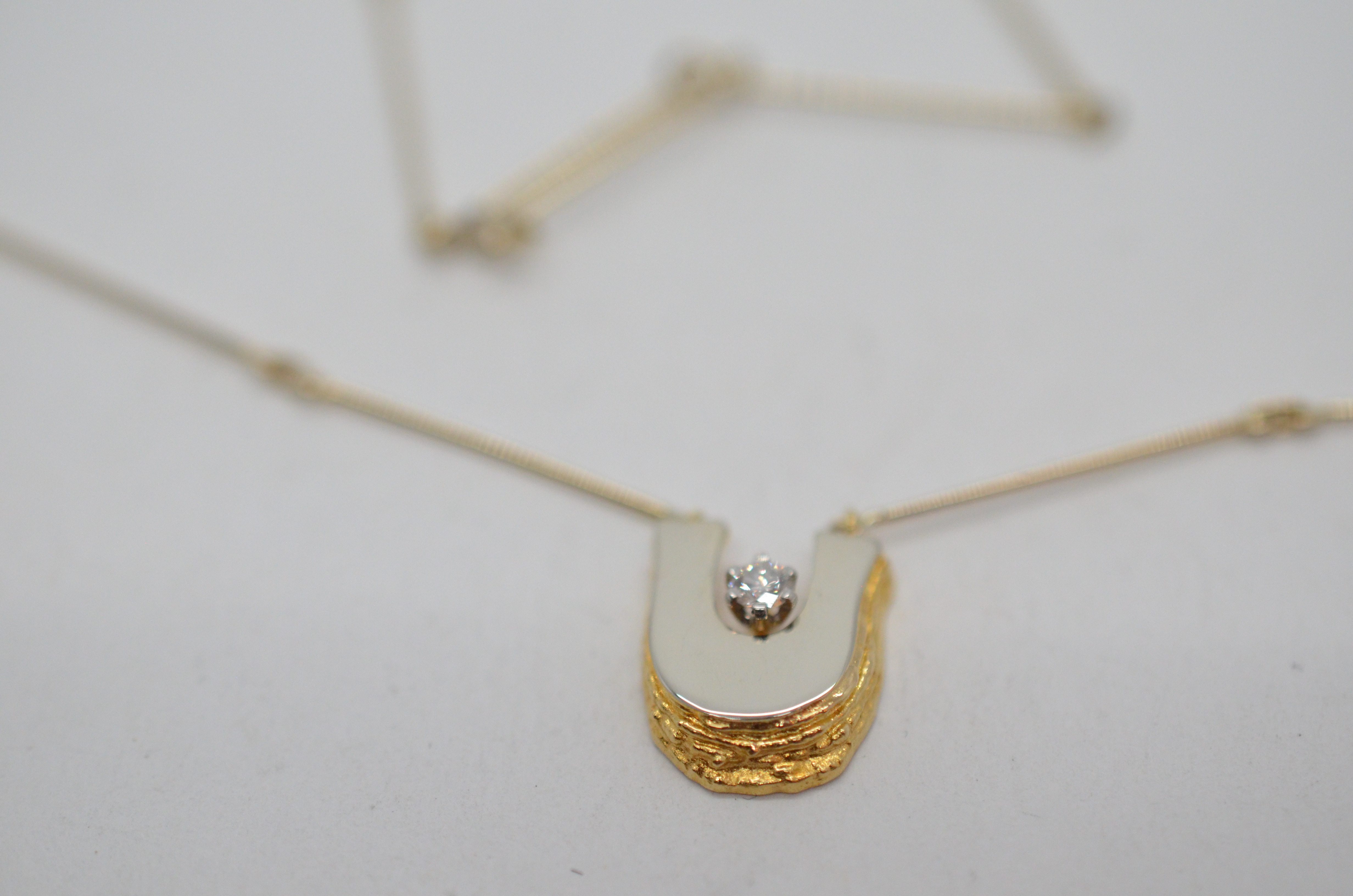 Lapponia gold necklace "Voce"