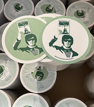 Matchprogrammets ölunderlägg