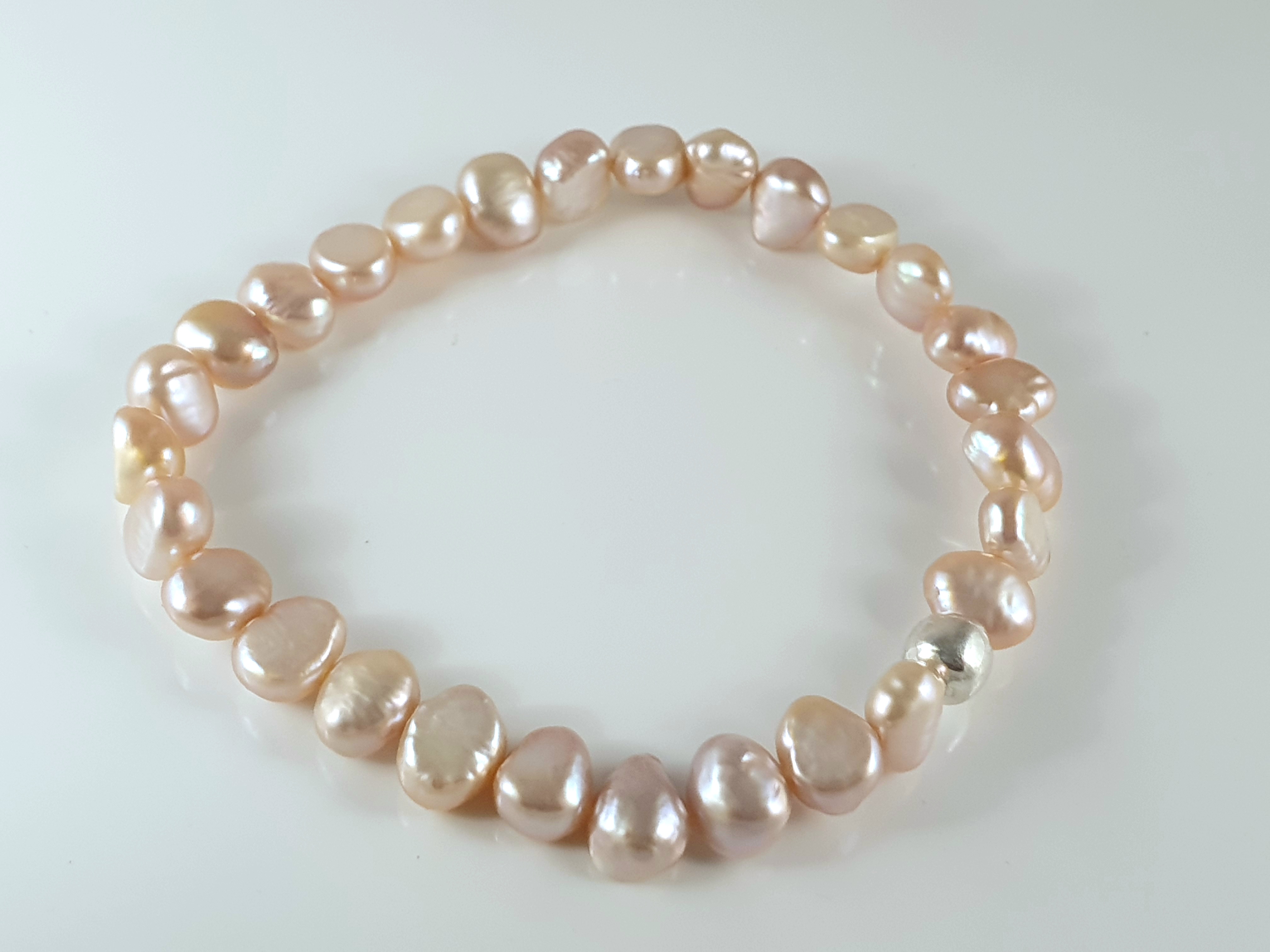 Odlade sötvattenpärlor naturfärgade rosa oregelbundna, kula 925-silver, armband