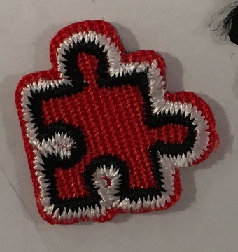 Röd Pusselbit
