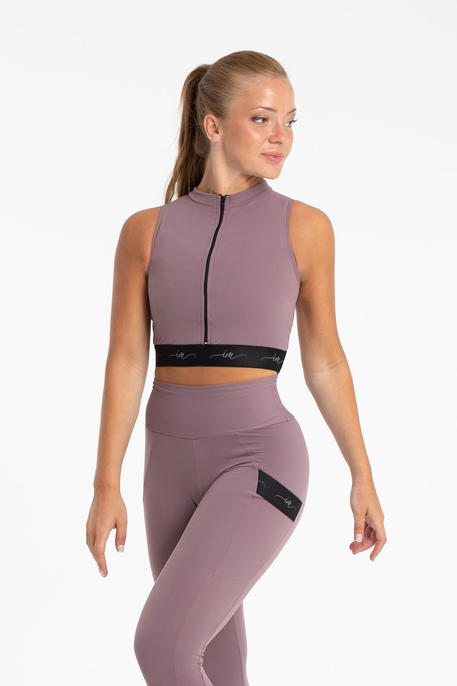 Ärmlös croptop i microfiber med dragkedja 