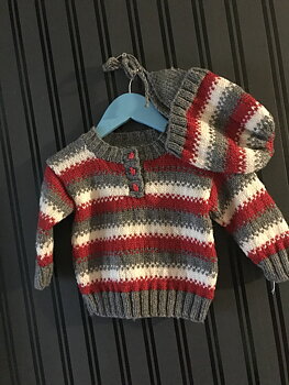 Handstickad babytröja och mössa med öronlappar. 9 mån.