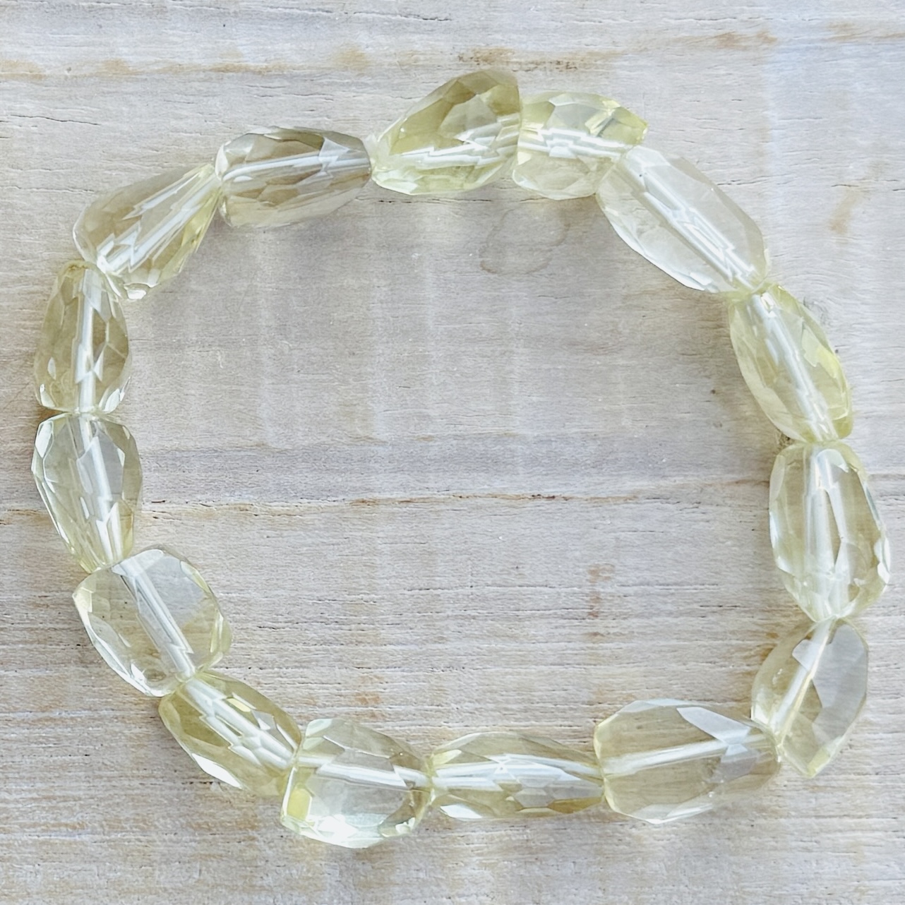 Armband 10mm Citronkvarts - Facett - Oval