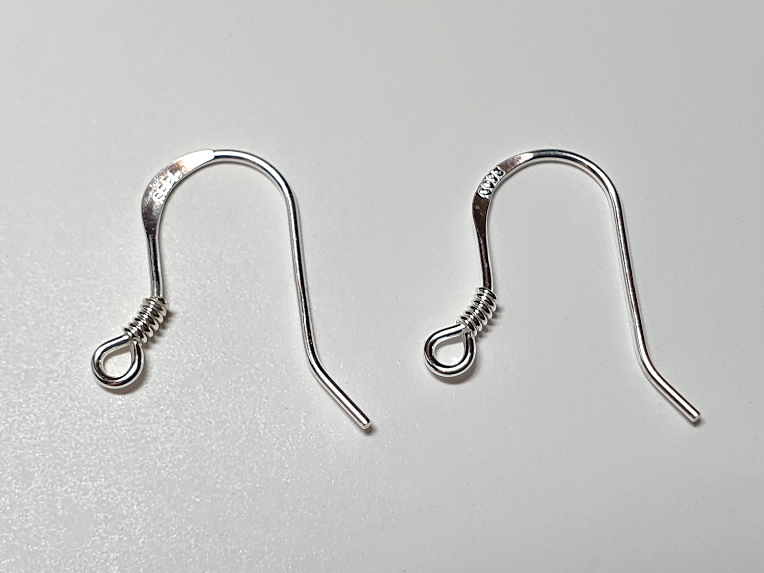 Örkrok snurr 0,65mm tråd höjd ca. 14,5mm 10 par/fp Pris/fp 925-silver ( ny )