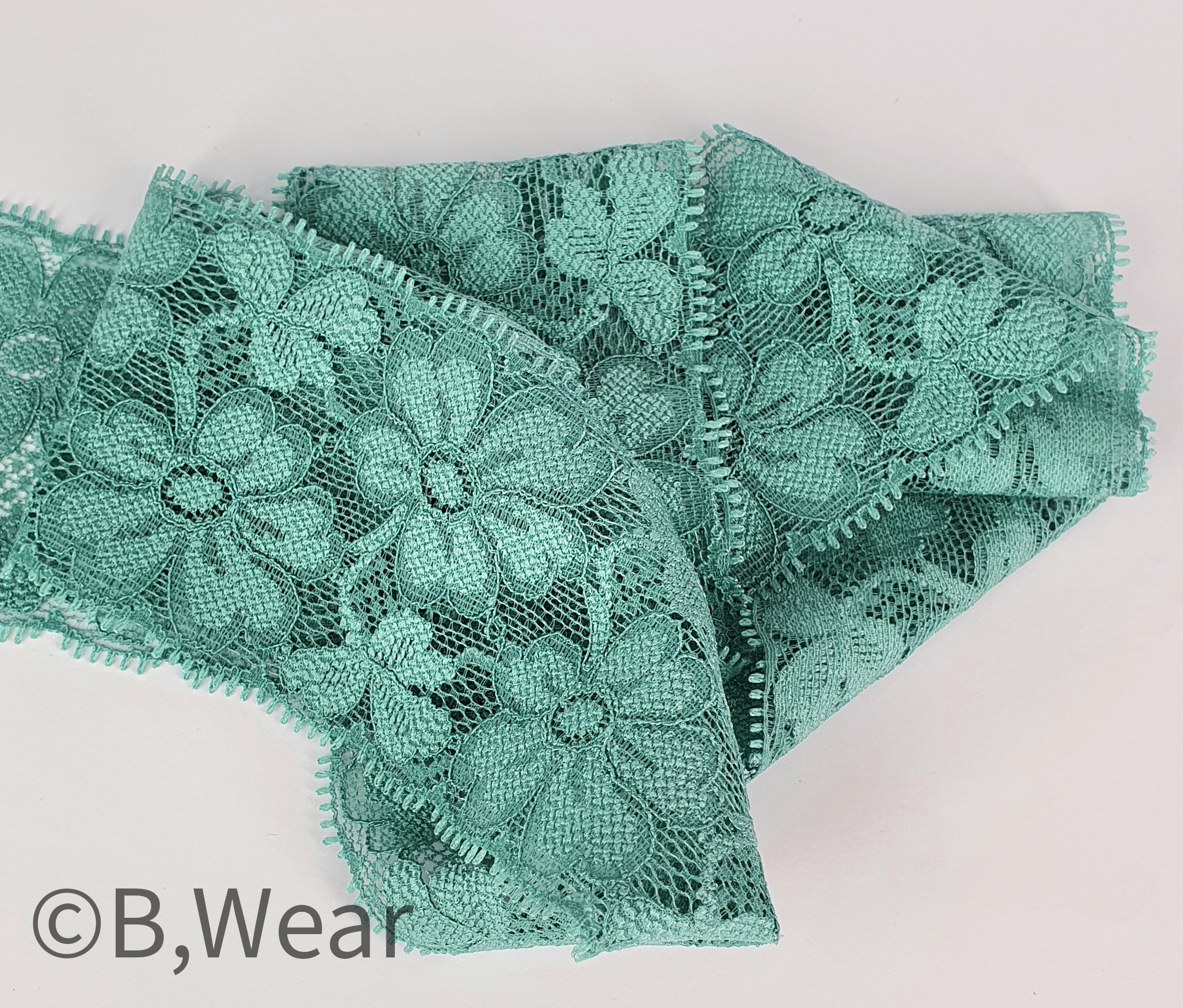 Soft stretch lace with flowers in Old Green 60 mm