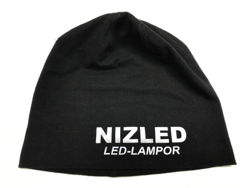 Nizled mössa med reflextryck