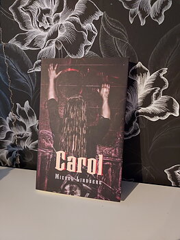 Carol, Micael Lindberg