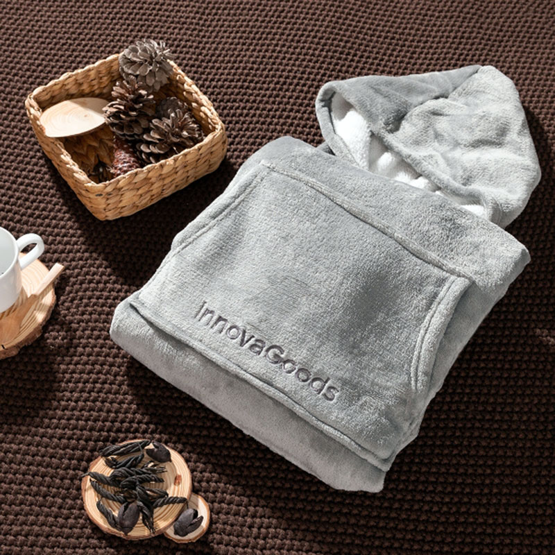 Ihopvikt oversized sherpa fleece hoodie på ett bord