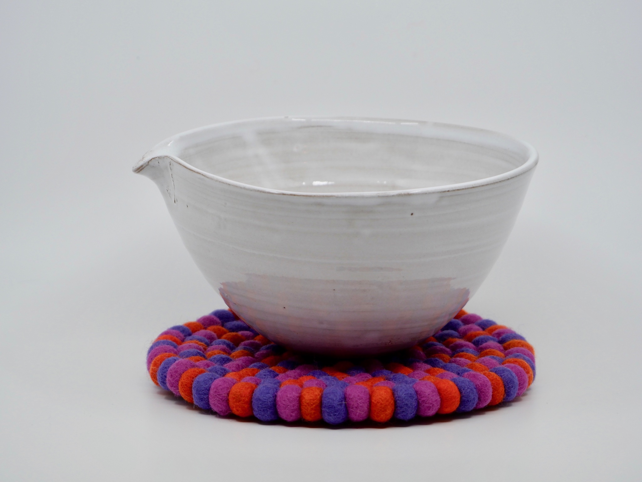 Grytunderlägg i tovad ull