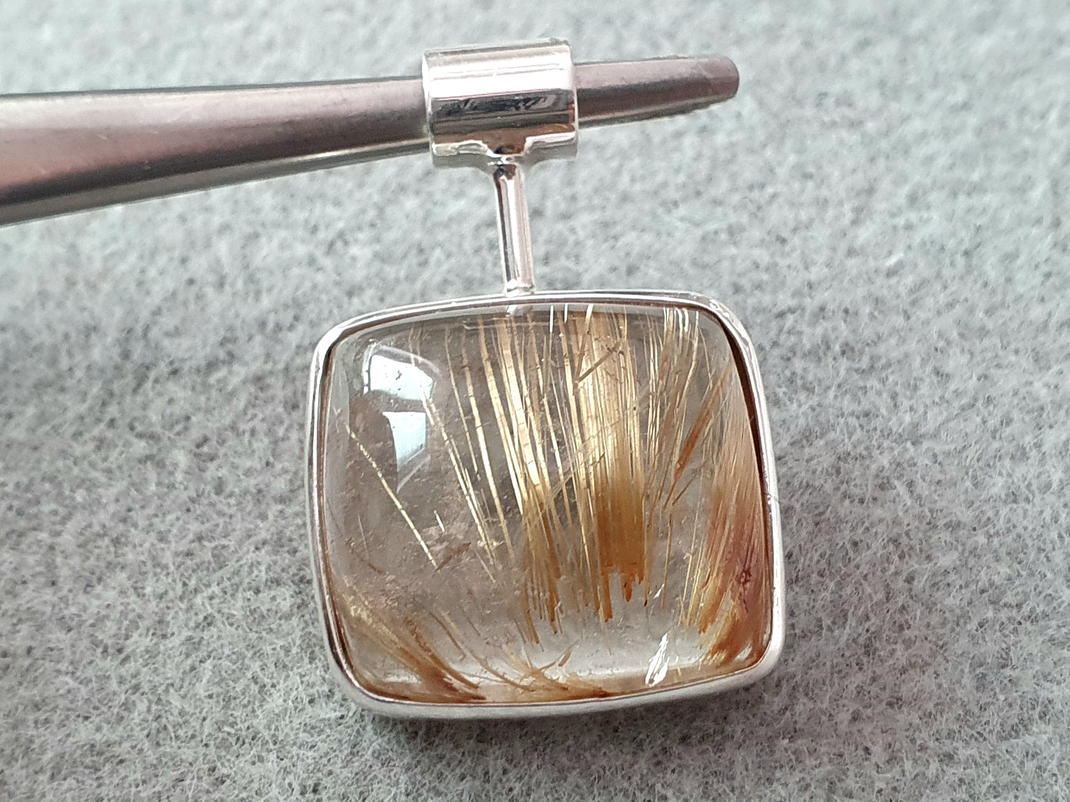 Pendant with rutilated quartz and sterling silver