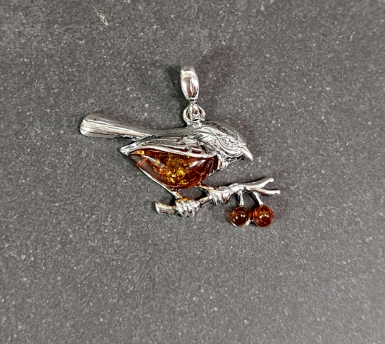 Silverhänge Fågel med Bärnsten
