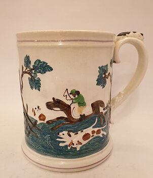 Beer cheese mug with hunting motif