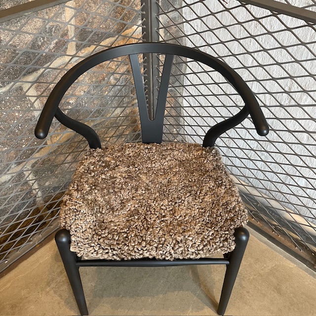 Medium brown sheepskin cushion for Y chair