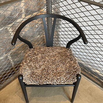 Medium brown sheepskin cushion for Y chair