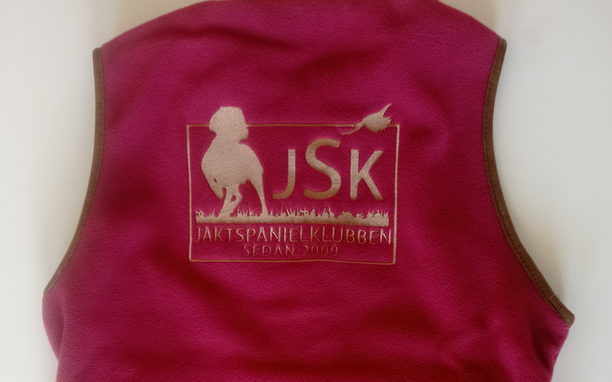 Damväst i Fleece, Oliv, Rosell och Marinblå med JSK  logga - 2