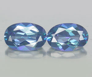 2 piezas de topacio azul azotico natural a juego con brillo superior, peso total de 1,12 quilates